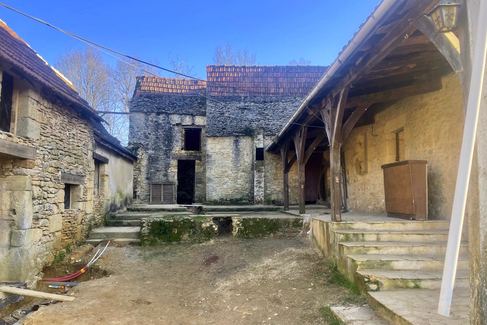 Interior courtyard of the exposed stone farmhouse